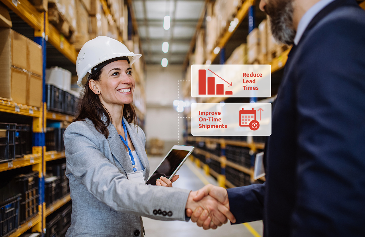 manufacturers shaking hands happy