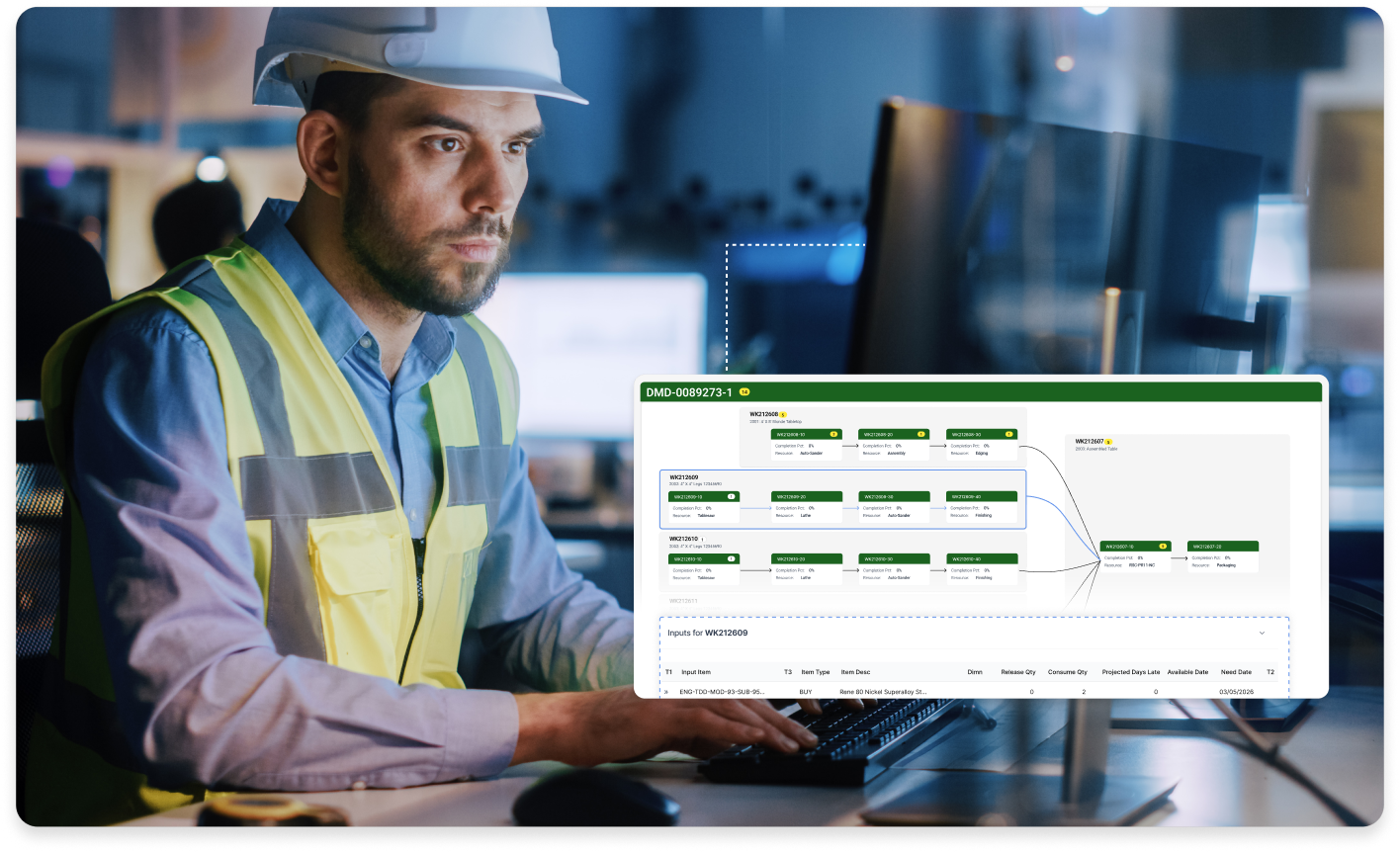 male manufacturer looking at a computer screen analyzing complex structures in production planning