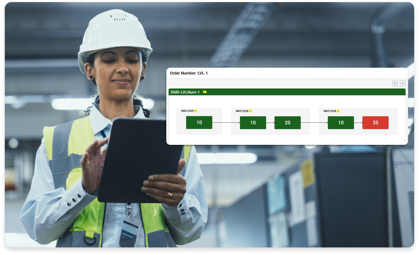 Female manufacture reviewing a screen with production plan with red and green statuses